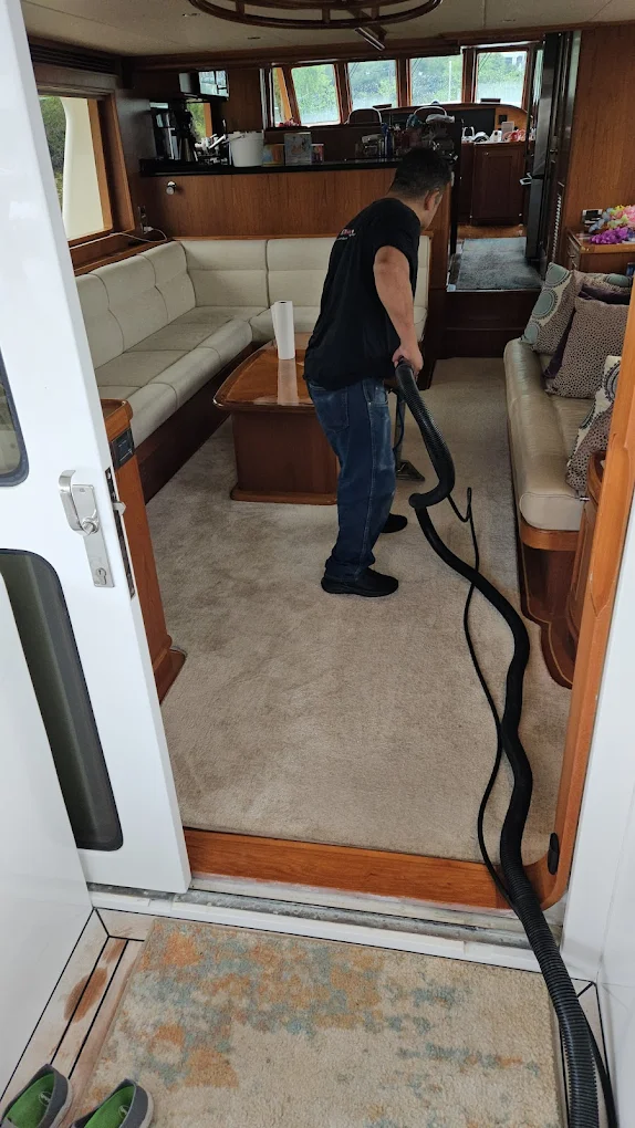 Same Day Carpet Cleaning technician reviewing a free quote with a happy New Jersey homeowner